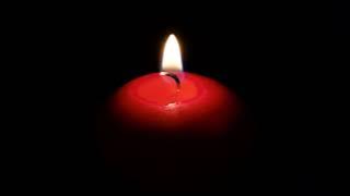 Background Video Cahaya Lilin Dalam Kegelapan