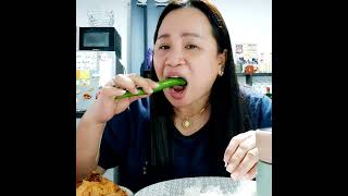 Eating green chili yummy