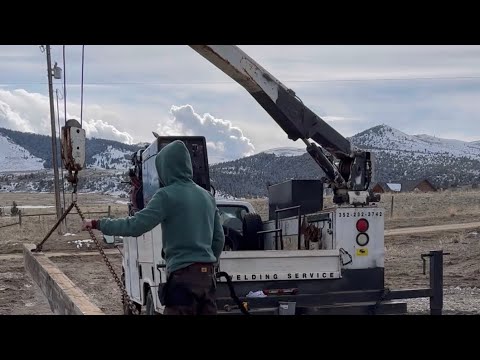 Pulling a wood beam out the mud and snow!