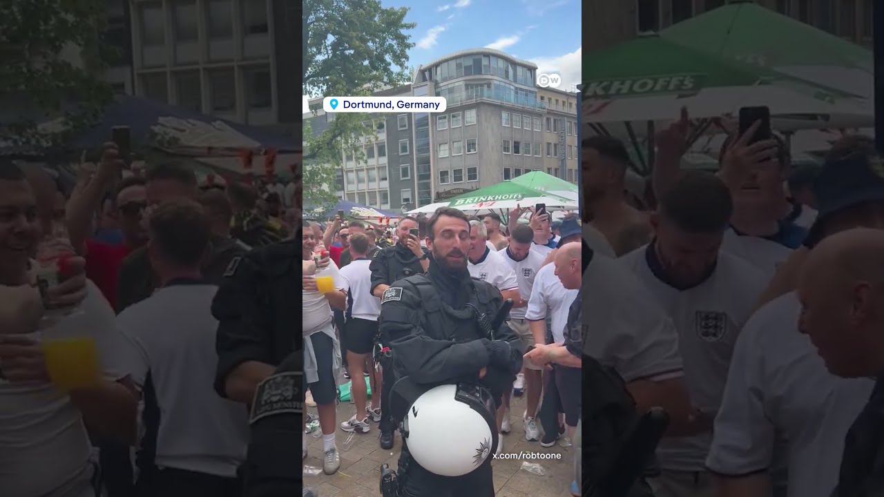 English Fans Sing To German Police Officer Who Looks Like Southgate