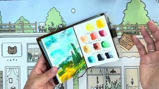 Art Tool Kit, Royal Talens Van Gogh watercolors, Travelers Company olive passport watercolor insert.