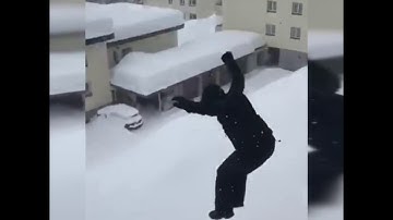 Fourth floor jump into the snow in Davos, Switzerland
