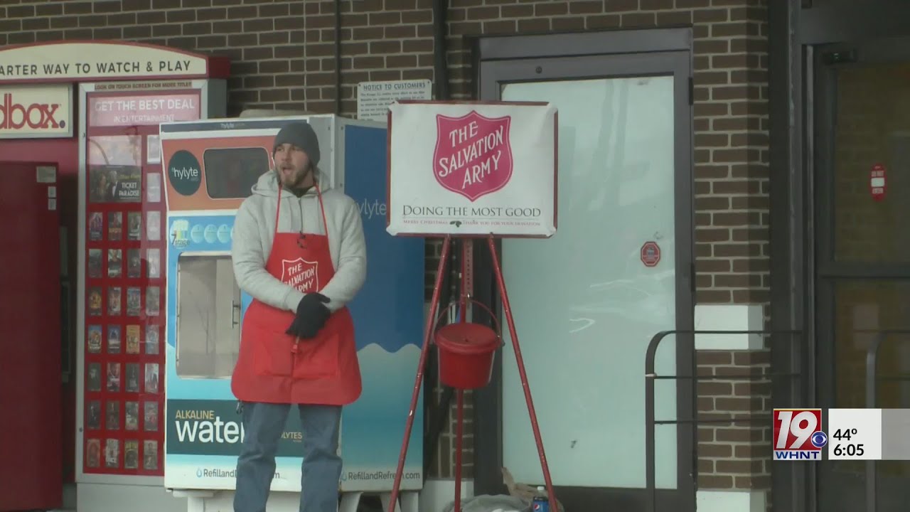 Red Kettle Volunteer Sings along while Bell ringing YouTube