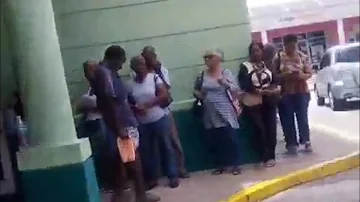 SurePay - How long do you stand on that line - Walk Around Barbados - Barbados