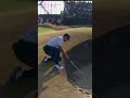 Bryson had to get creative to hit this bunker shot
