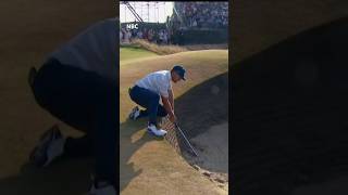 Bryson had to get creative to hit this bunker shot