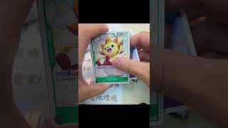 Trying to pull hits inside this underground card shop in Taiwan