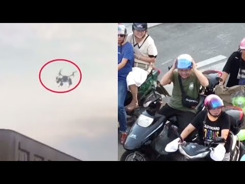 Traffic officer in China uses drones to give orders from above