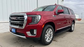 2024 GMC Yukon XL SLT Volcanic Red Tintcoat With Dark Walnut/Slate Interior.