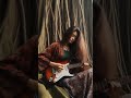 Fierce Indonesian Guitarist in Traditional Attire Rocks Iconic Cover with Cultural Fusion Energy