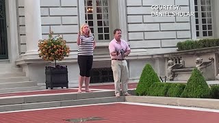 St. Louis couple aims firearms at protesters outside their home