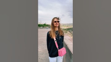 Daria looks at the sky and Yerevan from the top of the Cascade complex ⛅️ 🌆