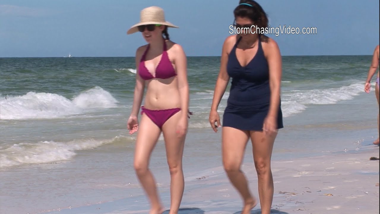 Beach goers escape the Florida heat this weekend by hitting sunny Siesta Ke...