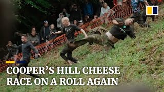Cheese-rolling race in England returns after pandemic hiatus
