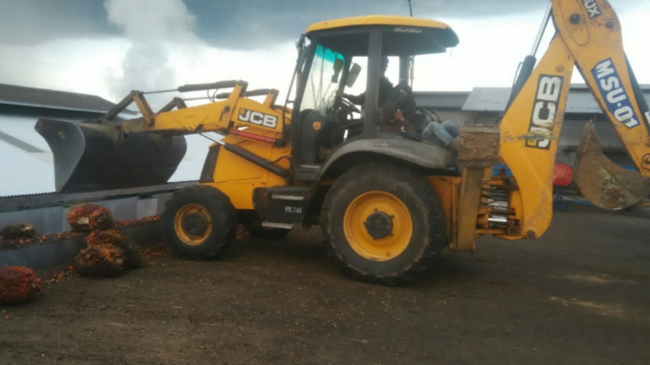 alat berat di loading ramp pabrik sawit - YouTube