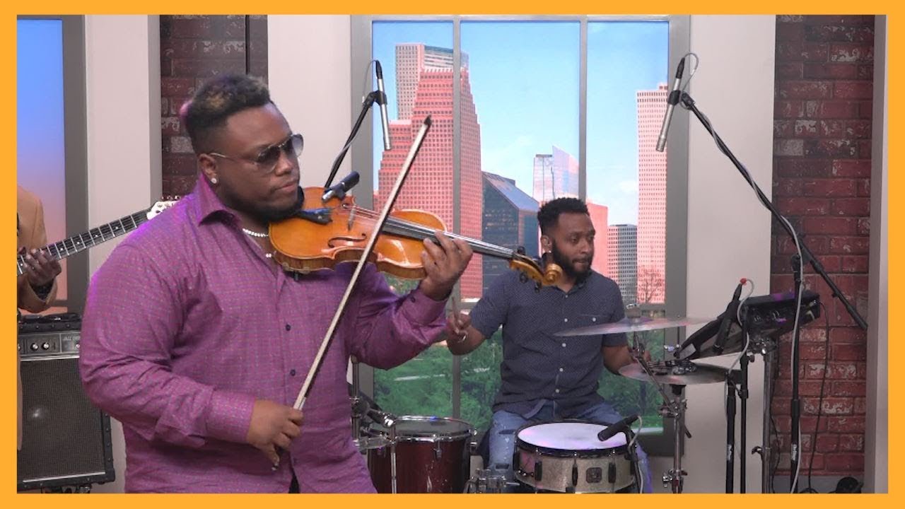 Violinist Dominique Hammons performs his song 