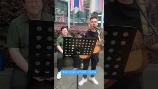 You Singer trying to get some money at Bukit Bintang Kuala Lumpur.#travel #song #kualalumpur