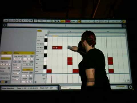 Orvtronixxx programs a MIDI drum sequence on his wall
