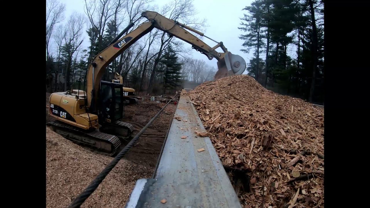Trucking vlog 11 hauling wood chips away from a million dollar house