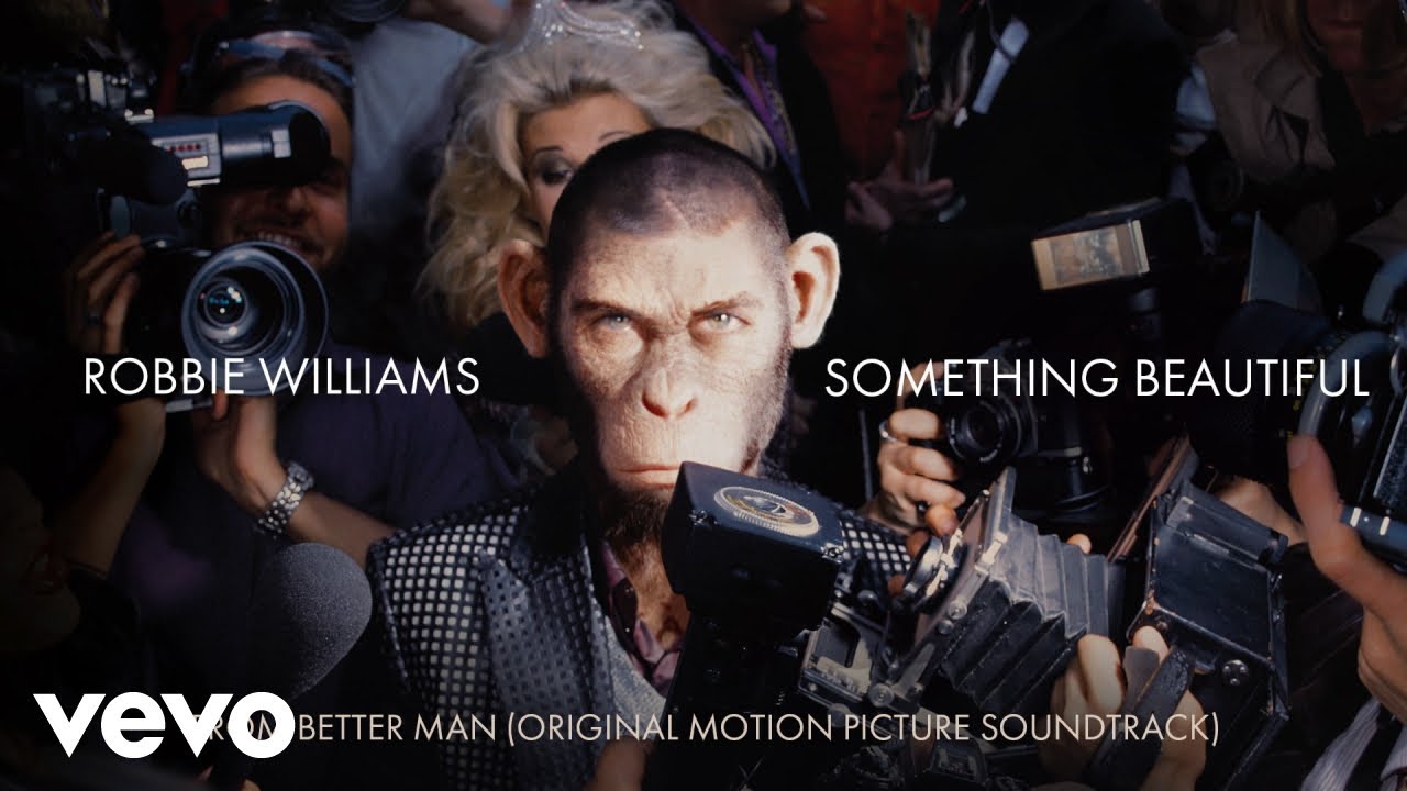 Assista a Robbie Williams - Something Beautiful (Taken from 'Better Man' Soundtrack) no YouTube