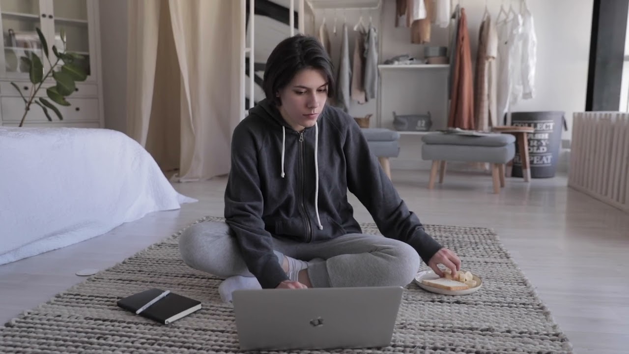 Productive Work-from-Home Routine: Woman Balancing Work and Meal | 4K Free Stock Video