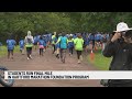 Connecticut students crossing finish line of youth running program