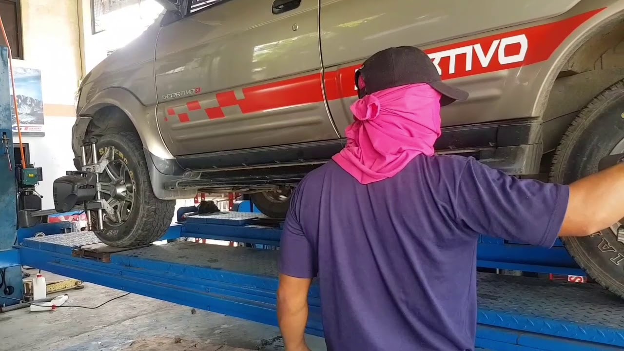 Isuzu Sportivo front wheel alignment, toe IN adjusment YouTube