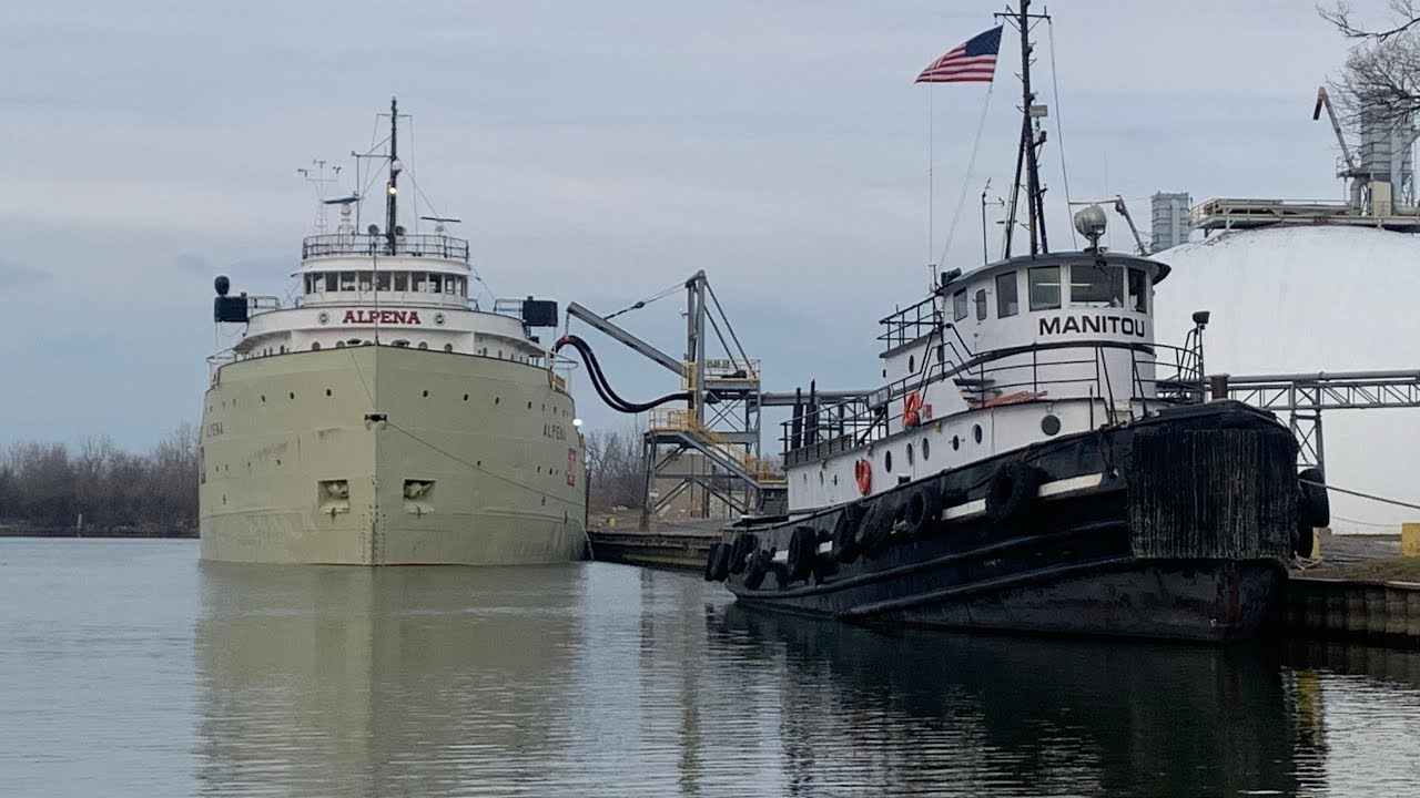SS Alpena and tug Manitou tied up at Essexville Mi Lafarge cement