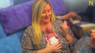 Mother meets premature baby for the first time