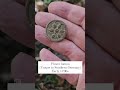 A crudely cast German flower button. Typically found in southern Germany.  Early 1700s.