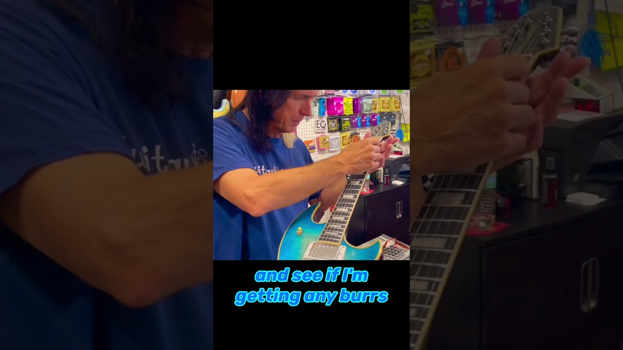 Professional Guitar Dealer looks at my Scarred Reaper! 