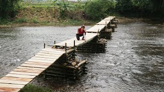 Building a bamboo bridge to the island off grid  Finish the floor, Make Iron ropes prevent floods