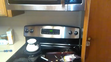 GE microwave overhead stove bulbs socket broken off unplug A/C B4 Sharpie Fix
