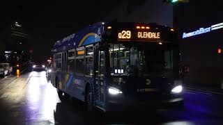 MTA NYCT #9542 on the Q29 to Glendale on 80th St going past Atlas Park Mall