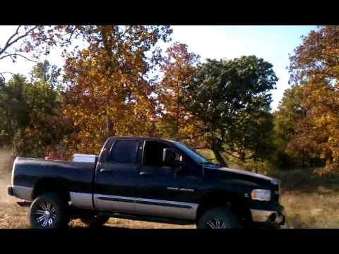 Dodge cummins pulls down tree,straight horsepowe - YouTube