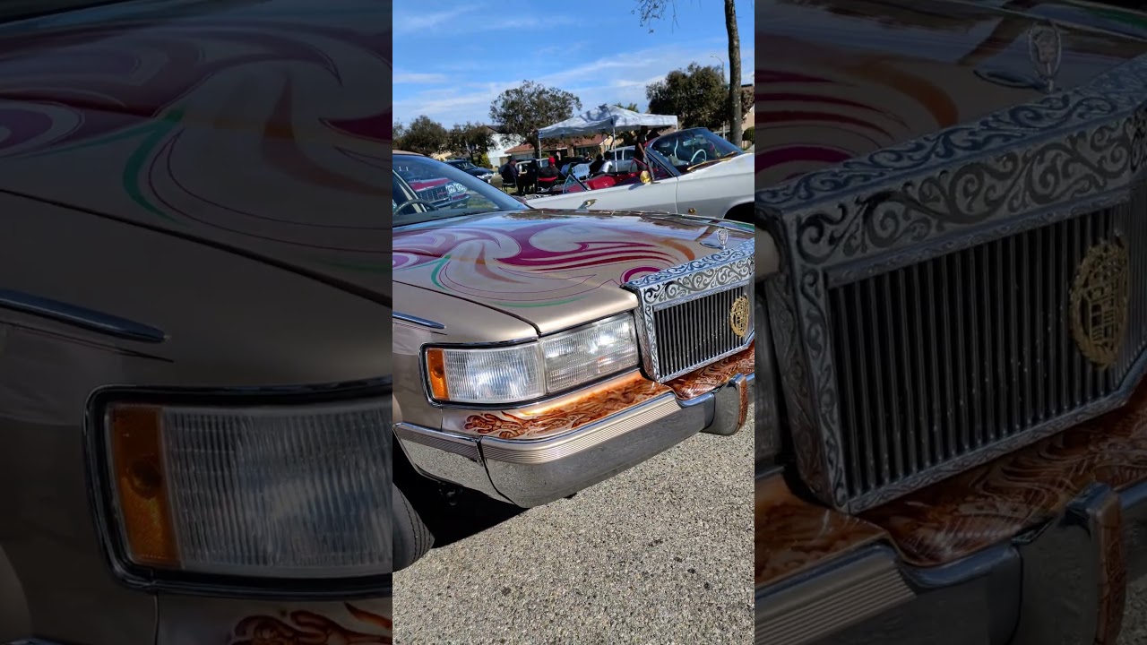 Champagne Cadillac Fleetwood lowrider with the swirl paint 