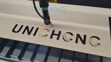 LXJ1390 laser machine cutting plywood UNICHCNC