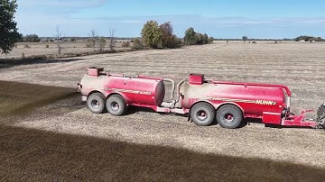 CANADIAN FARMER - MANURE MUCK MASHERS --- and SLURRY SLINGERS. Nuhn Quad Trac tankers to the task.