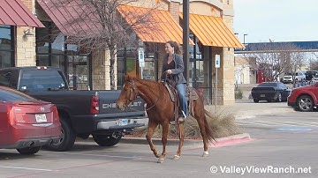 Lady - riding in town - ValleyViewRanch.net