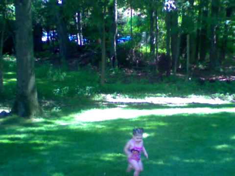 emily and blair playing w the hose