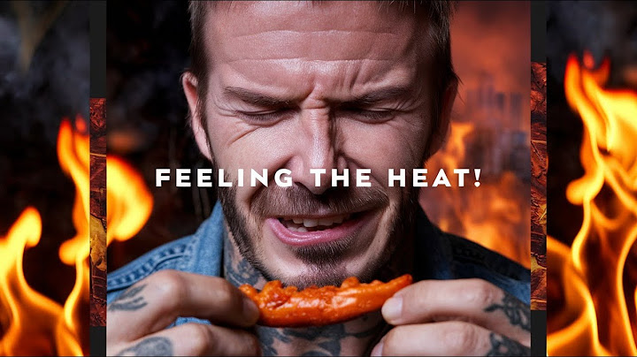 David Beckham Embraces the Moment While Eating Spicy Wings