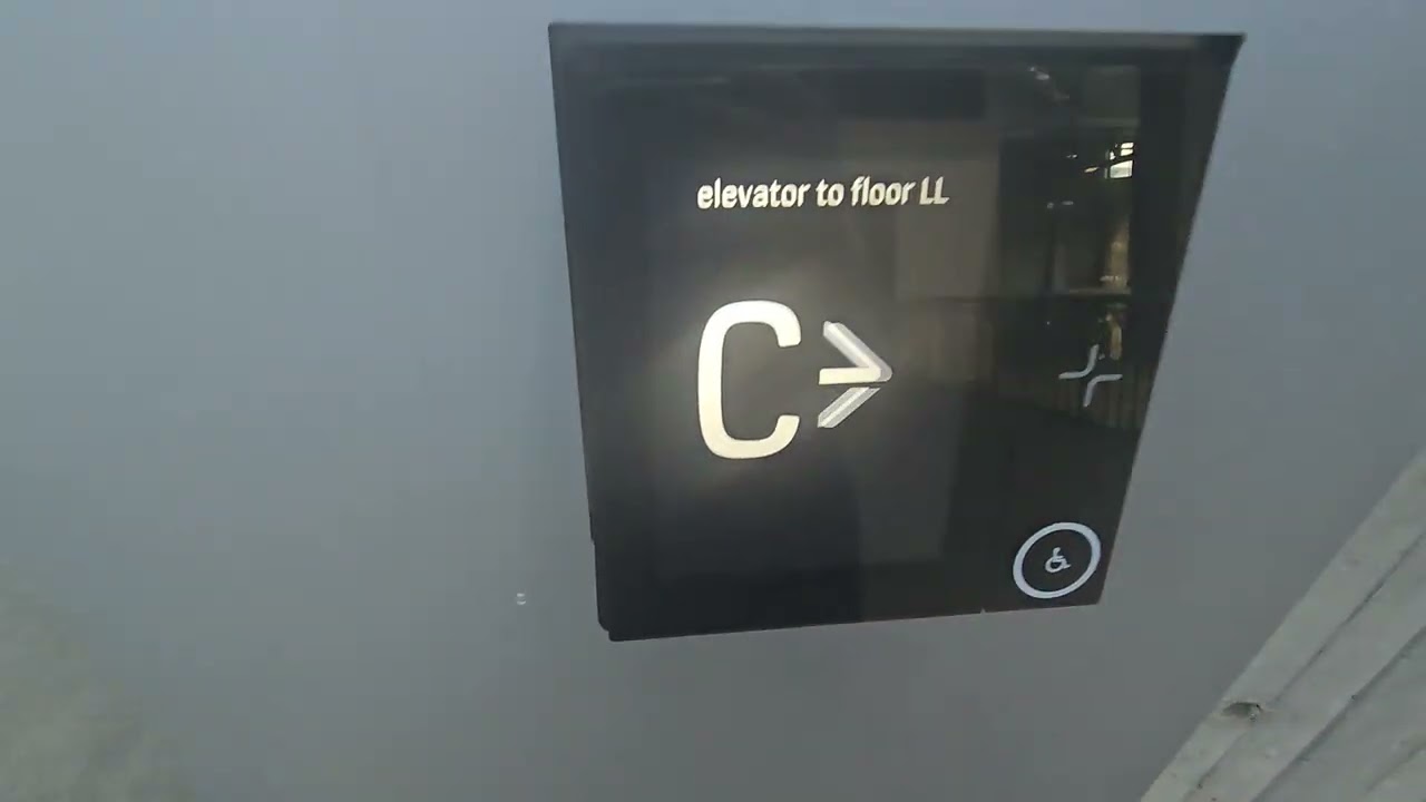 Tall elevators at Plaza of the Americas Office/Hotel in Downtown Dallas, TX.