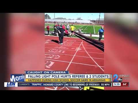 Falling light pole hurts referee and two students in Arkansas