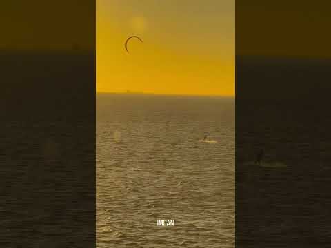 My Neighbor Making Full Use Of Windy Saturday As Sun Sets On Tampa Bay At Apollo Beach FL - IMRAN™