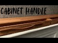 hardwood handle made from scrap wood.