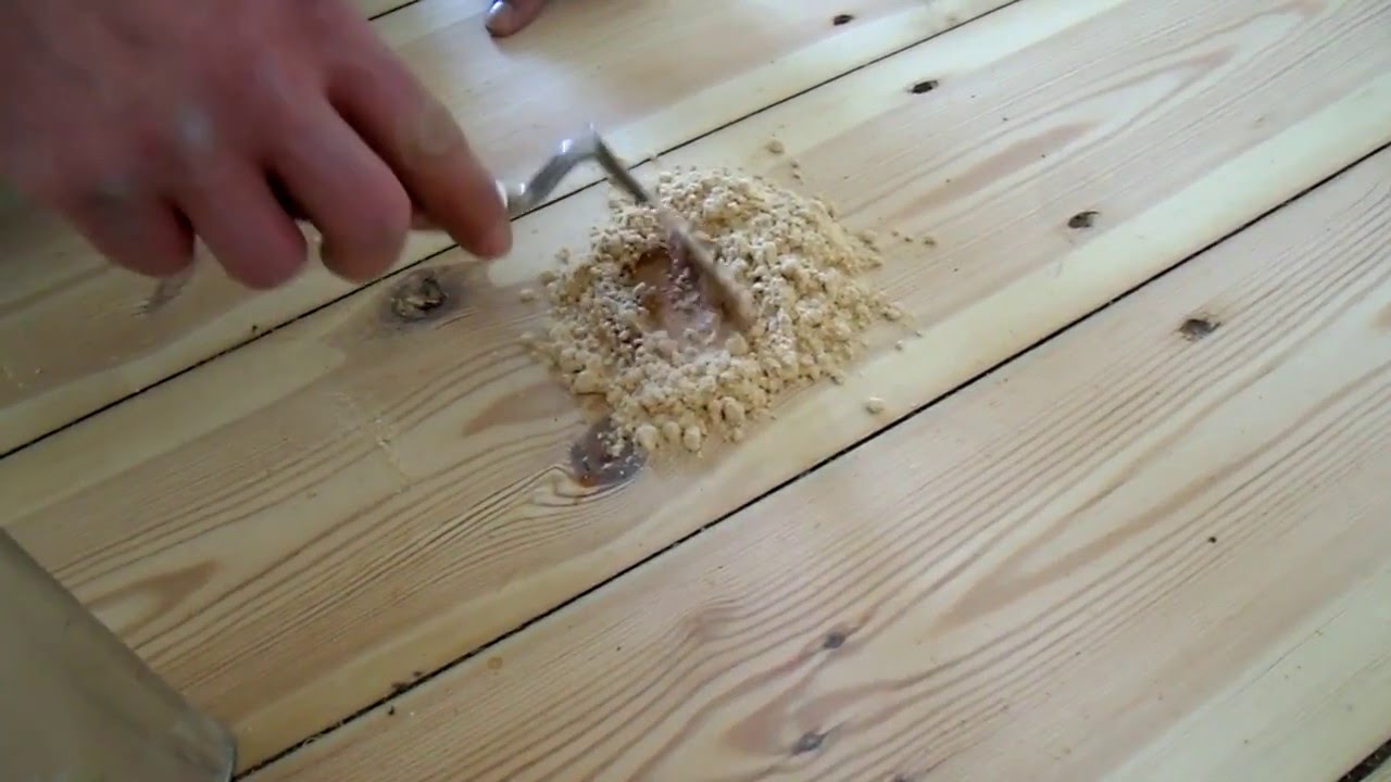 Sanding Floorboards, hammering in nails, cleaning gaps ...