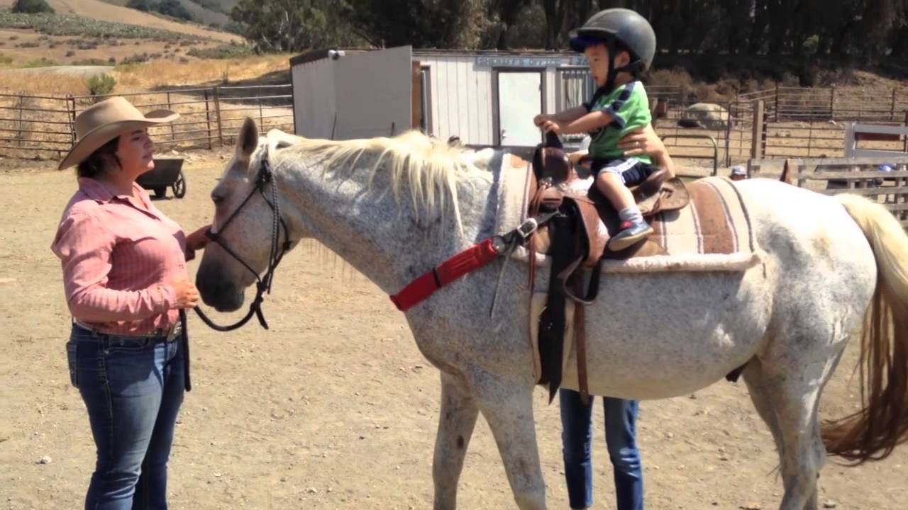 Baby riding horse at Madonna Inn Trail 