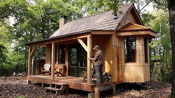 Man Builds a Wooden House in the Forest Using Simple Tools
