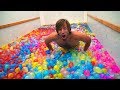 Moving truck FILLED with 10,000 WATER BALLOONS!