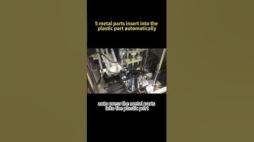 metal parts insert into the plastic part automation